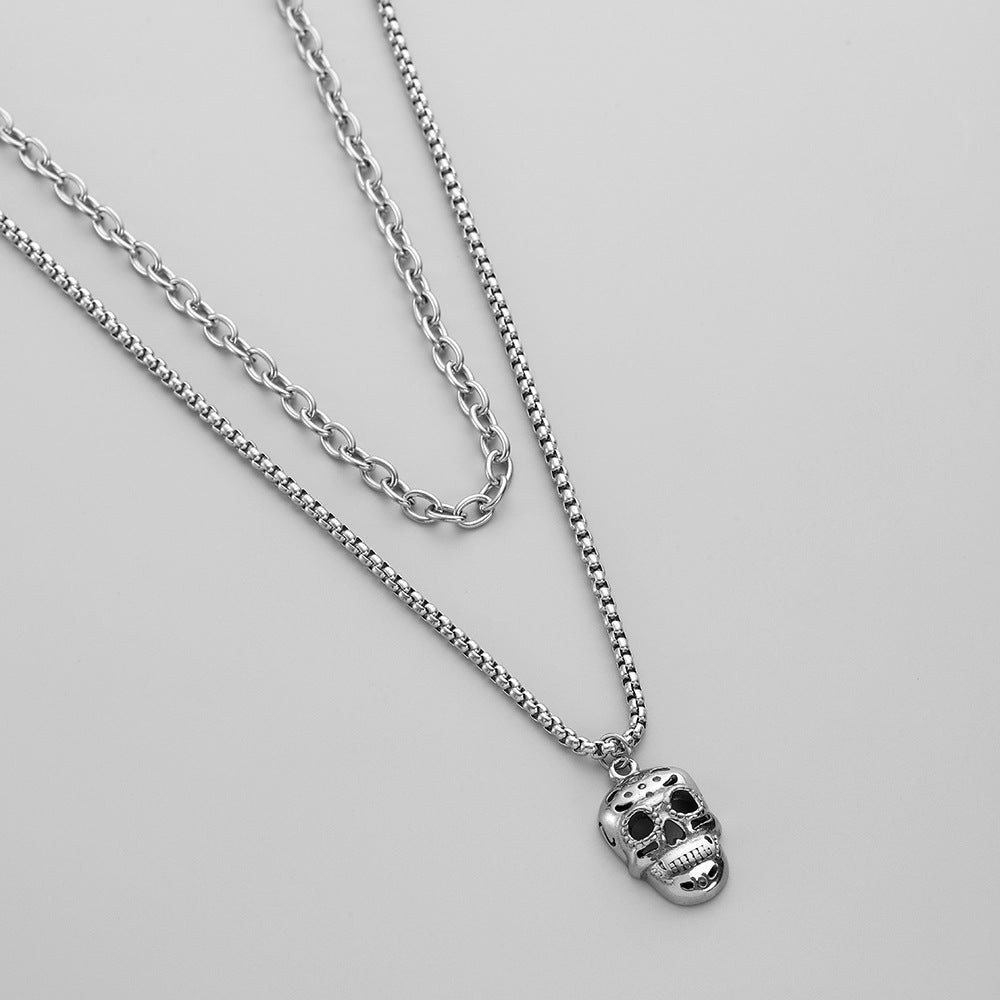 Venta al por mayor Collar de hombre con colgante de calavera doble de acero inoxidable